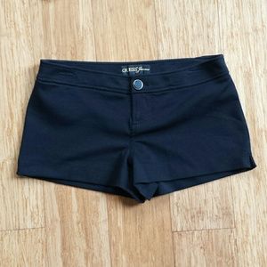 Black stretch short shorts.